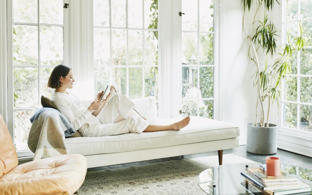 Woman relaxing on couch.